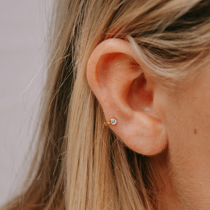 Tiny Side Ear Huggies (Gold & Clear)