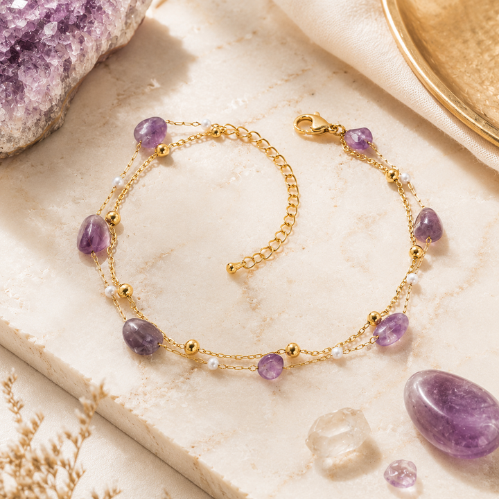 gold PVD waterproof anklet with double chain and amethyst stones and pearl beads.