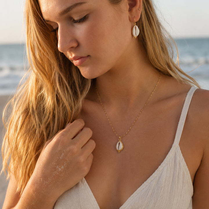 Necklaces - gold cowrie neckace