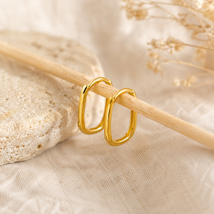 Earrings - gold oval huggies