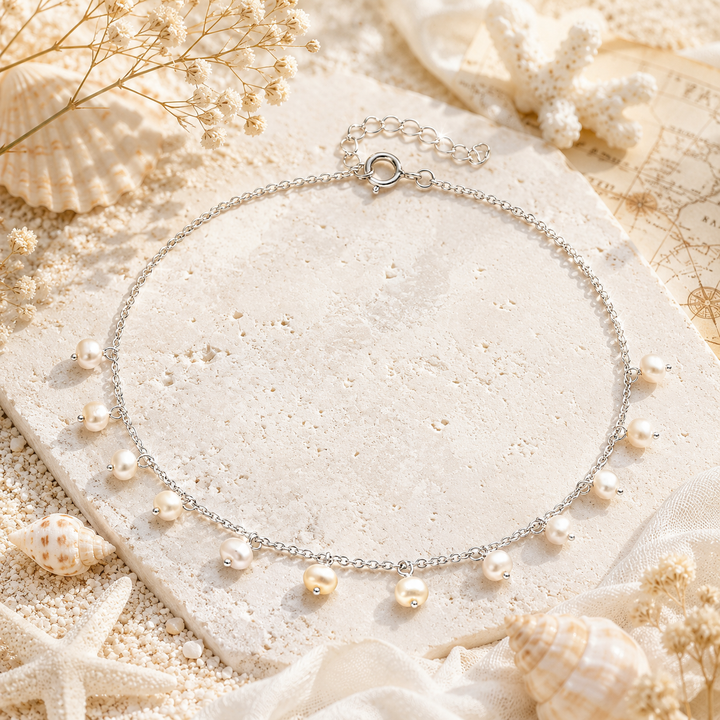 Dainty sterling silver chain anklet with hanging fresh water pearls.