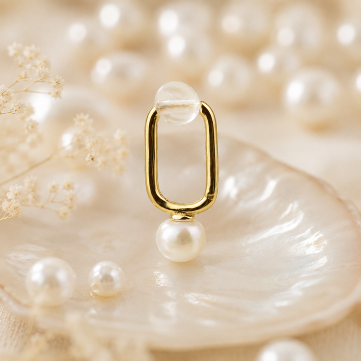 Gold Oval Pearl Huggies
