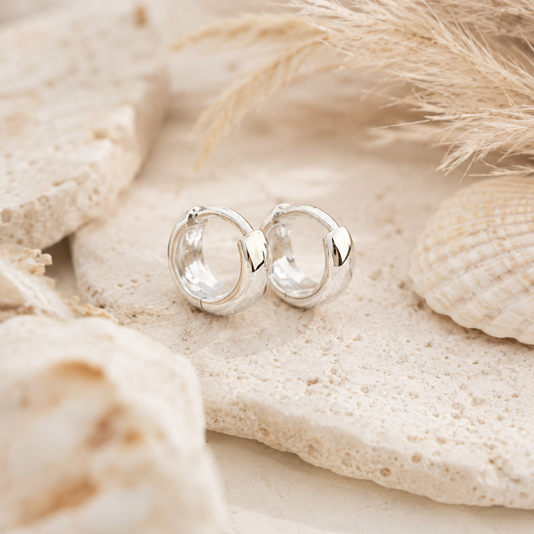 Earrings - Sterling silver wide huggies. 