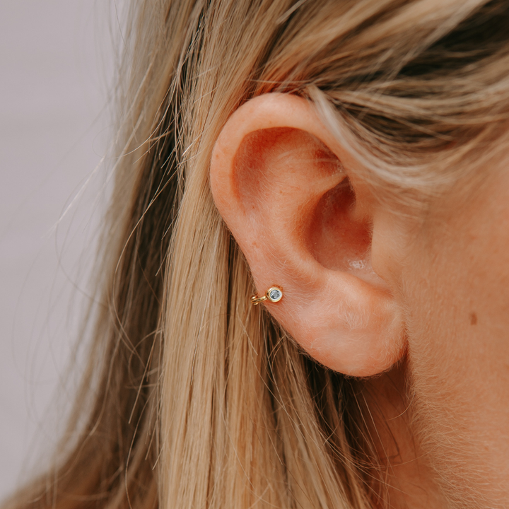 Tiny Side Ear Huggies (Gold & Clear)